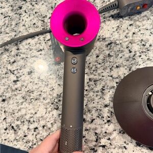 Dyson Hair Dryer in Vibrant Pink and Sleek Gray